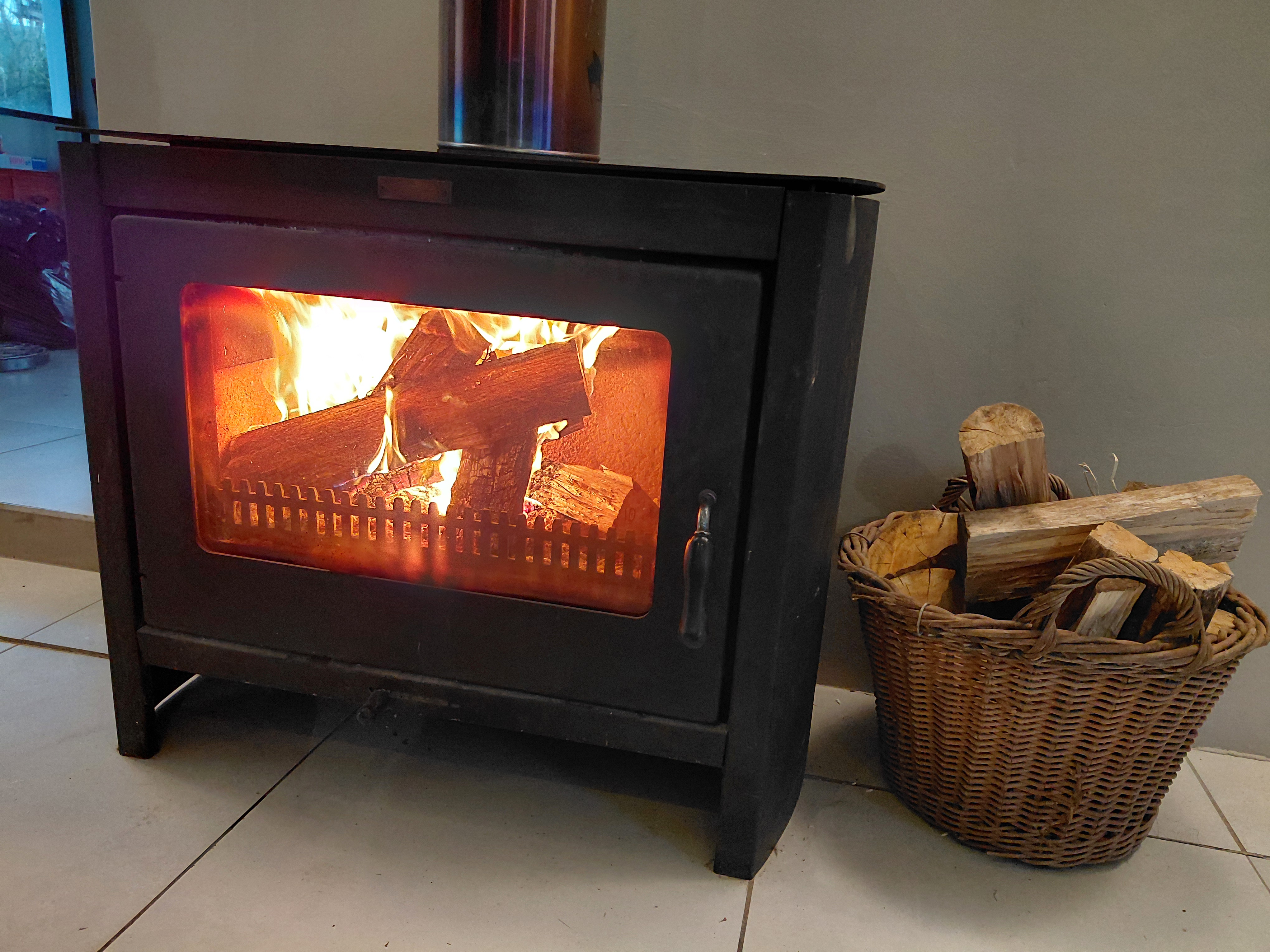 Cosy living room with wood-burning fireplace
